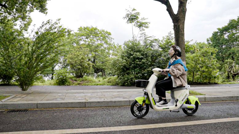 共享電單車與出租車都是城市交通的一部分